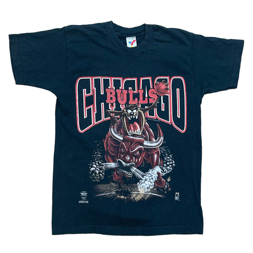 black shirt. chicago bulls across the chest with the tasmanian devil ridinig the chicago bulls bull. 