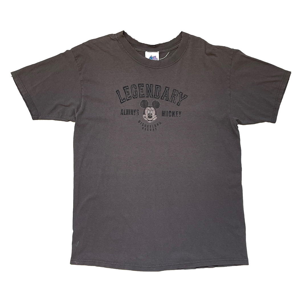 dark grey short sleeve shirt from disneyland resort. center of chest has a mickey face with the words legendary on top and always mickey to the side. below says disneyland resort